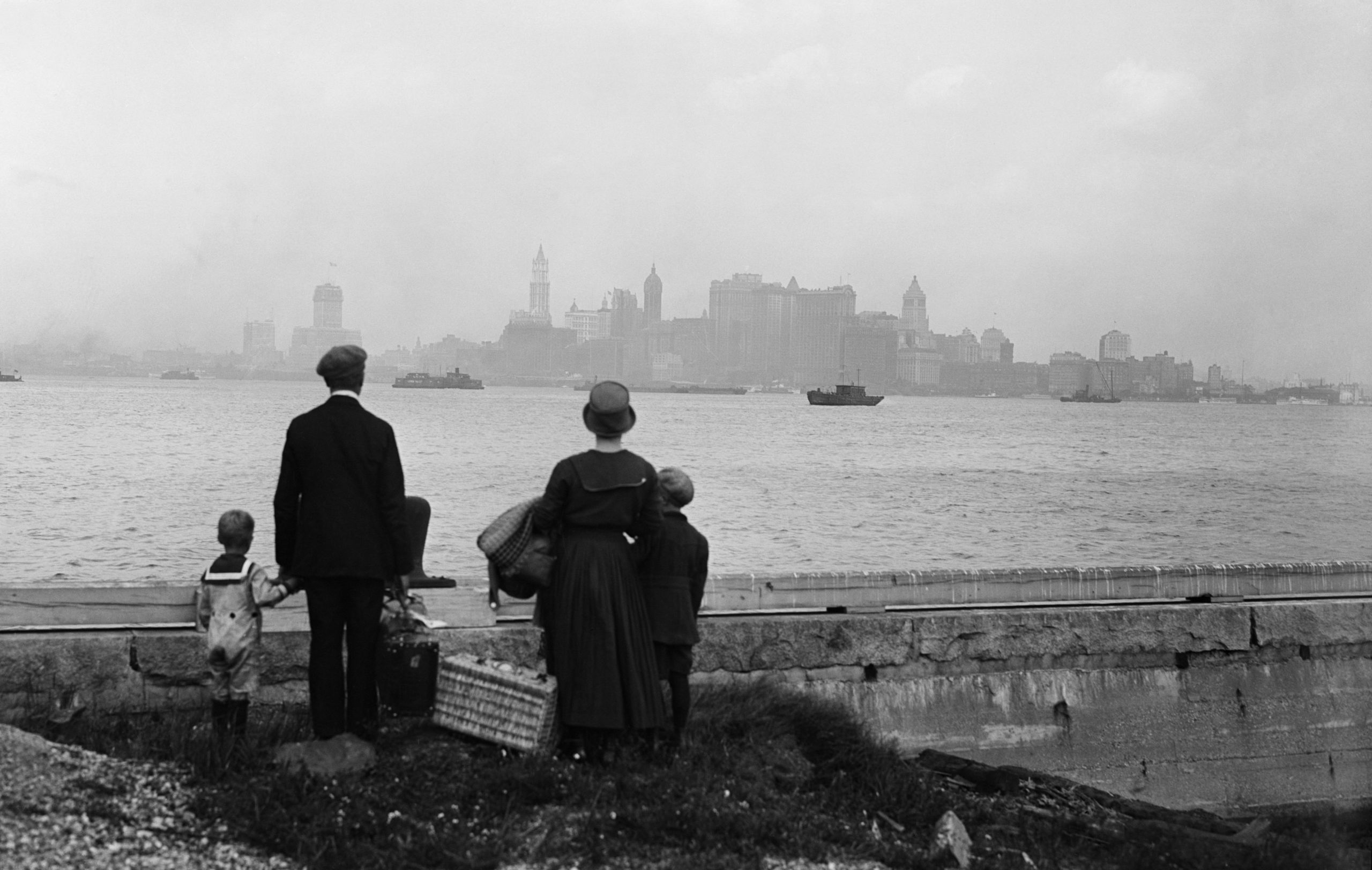 Immigrant Family Viewing New York City from Ellis Island